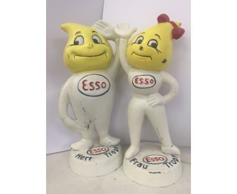 A pair of cast-iron Esso figures