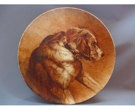 A Victorian ceramic charger hand painted with a labrador signed Hannah Fenton (Newall) dated 1881, diameter:51cm