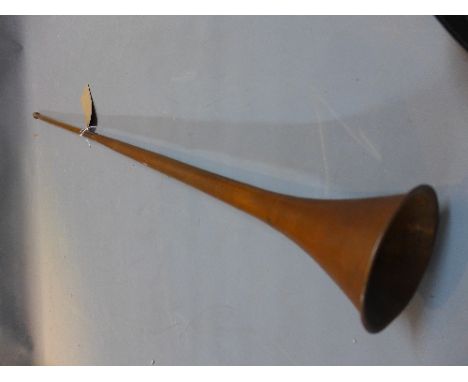 A vintage copper hunting bugle. 