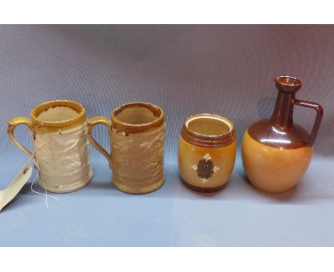 A Doulton Lambeth tobacco jar (lacking lid) together with a Doulton Lambeth jug and a pair of Fulham stone ware tankards. 