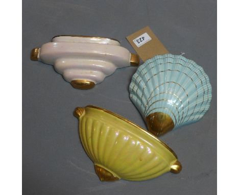 Three Art Deco ceramic wall pockets. 