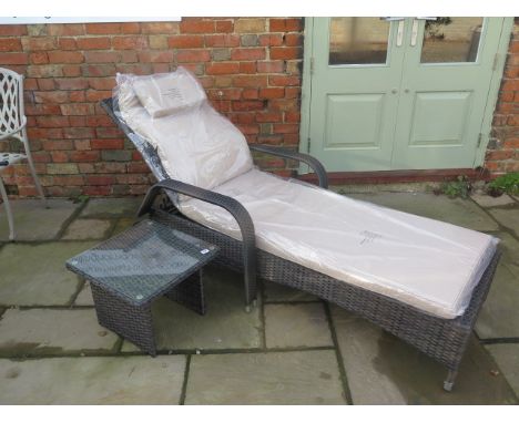 A new Maze Rattan Florida sun lounger with a drinks table - cheapest internet prince £279 - boxed 