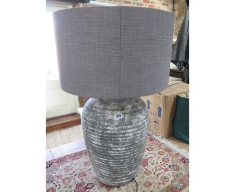 A large good quality table lamp and shade 