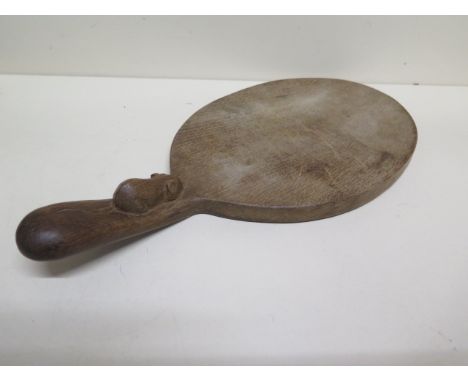 A Thompson Mouseman of Kilburn cheese board - 37cm x 18cm - no splits or cracks, some utensil marks 