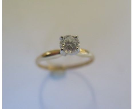 A 14ct yellow gold solitaire ring - the round brilliant cut diamond 0.52ct, VVS2, colour I - ring size O/P - approx weight 1.