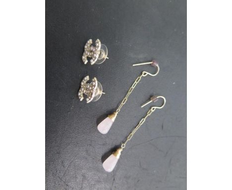 A pair of Chanel pearl earrings and a pair of gilt metal amethyst earrings