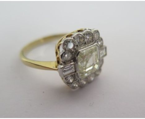 An Art Deco Style 18ct Yellow Gold, 2ct Asscher Cut Diamond Ring, Surrounded By 2 Baguettes and 12 Round Brilliant Cut Diamon