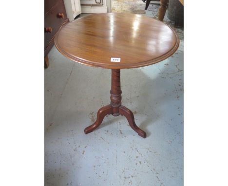 A 19th century walnut side table with a 54cm diameter top in good condition 