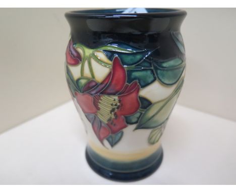 A Moorcroft c2000 vase - Height 13.5cm - some overall crazing otherwise good 