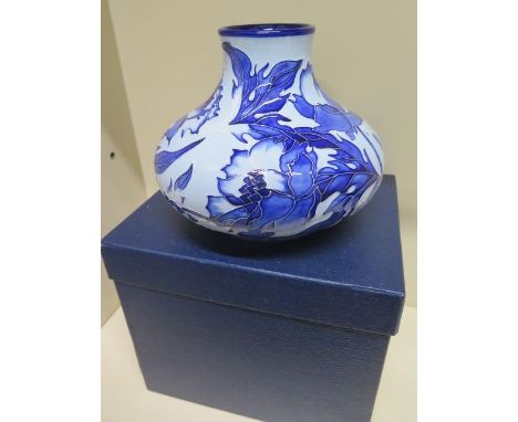A Moorcroft vase - Height 16cm - good condition with box 