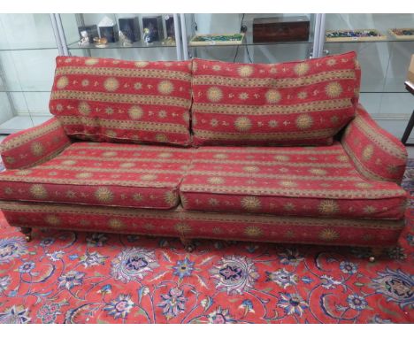 A modern sofa in sun motif fabric - Width 210cm x Height 81cm x Depth 108cm - in good condition 