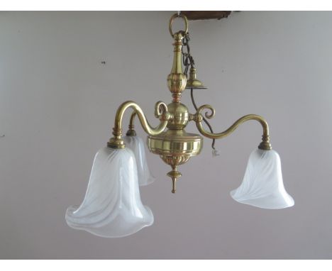 A brass three branch ceiling light with bell shaped glass shades - Width 53cm 