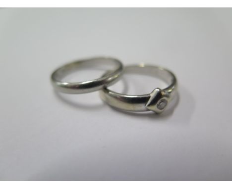 A platinum band ring size N - approx. weight 1.5 grams and a 9ct diamond ring size N - approx. weight 2.4 grams - diamond bri