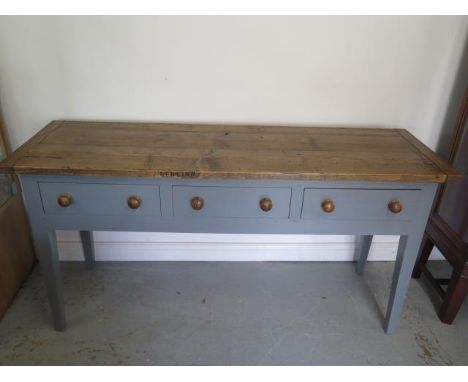 A painted pine three drawer kitchen/studio serving work table with a waxed pine top - Height 86cm x 172cm x 53cm 