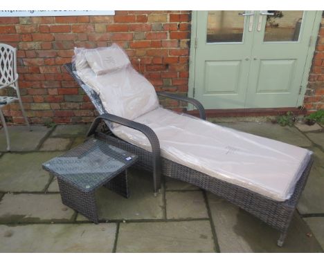 A new Maze Rattan Florida sun lounger with a drinks table - cheapest internet prince £279 - boxed 