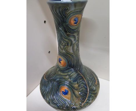 A Moorcroft Peacock feather vase - Height 29cm - slight crazing to base otherwise good condition 