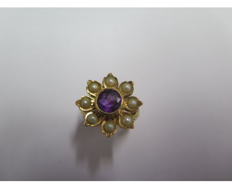 An 18ct yellow gold amethyst and pearl flower ring size M - approx weight 8.6 grams - in good condition 