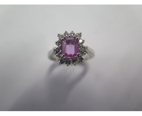 A pink sapphire and diamond 18ct white gold ring size L/M - head approx 10mm x 12mm - good condition, diamonds bright and liv