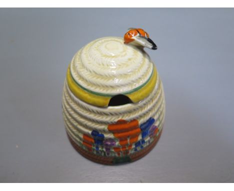 A Clarice Cliff Wilkinson Ltd Crocus Bizarre beehive honeypot - Height 10cm - chips to rims of top and base otherwise general