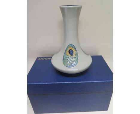 A Moorcroft peacock feather 2013 vase - Height 20cm - good condition with box 