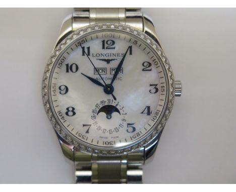 A Longines Master collection stainless steel diamond bezel gents automatic bracelet wristwatch with mother of pearl day/date 