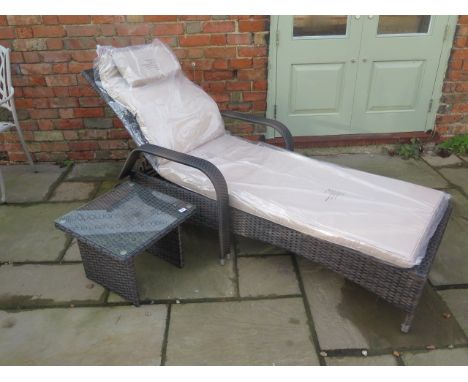 A new Maze Rattan Florida sun lounger with a drinks table - cheapest internet prince £279 