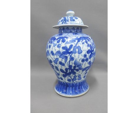 Chinese blue and white vase and cover with lappet leaf borders and allover foliate pattern with bats,  blue seal mark to the 