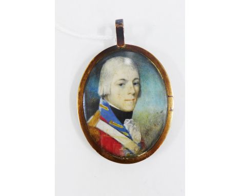 18th century portrait miniature of a young soldier, contained within a yellow metal memoriam locket with plaided hair verso a