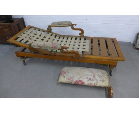 Victorian mahogany adjustable Campaign daybed, with detachable legs, upholstered headrest and arms, hinged with brass mounts 