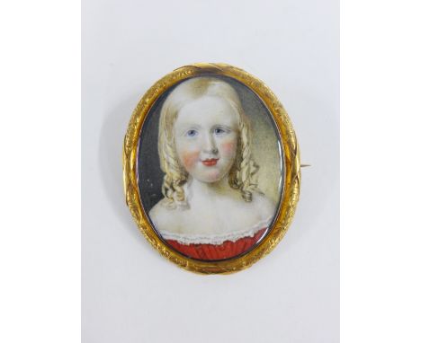 19th century portrait miniature of a young girl with blonde hair, wearing a red dress, contained within a yellow metal memori