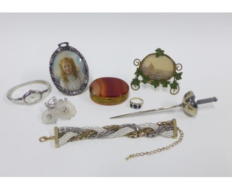 Early 20th century portrait miniature contained within a white metal frame, a silver dress ring, costume jewellery brooch and