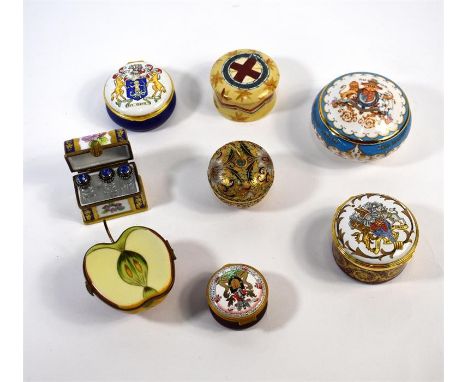 Two Limoges trinket boxes, one in the shape of half an apple, the other a domed casket containing three glass perfume bottles