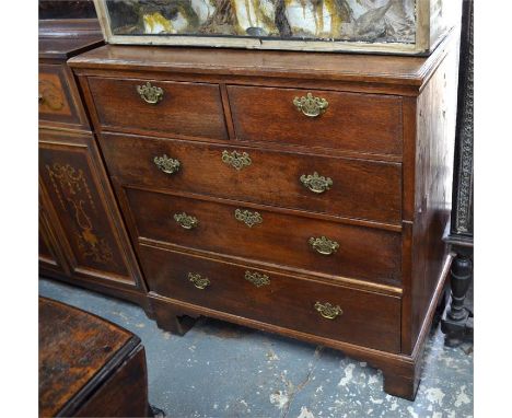 An 18th century chest of two short over three long graduated drawers, in two parts, raised on shaped bracket feet, 96 x 51 x 