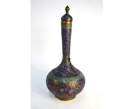 A Qajar, or other, metal and enamel vase with domed cover and knop finial, decorated with floral designs in turquoise and blu