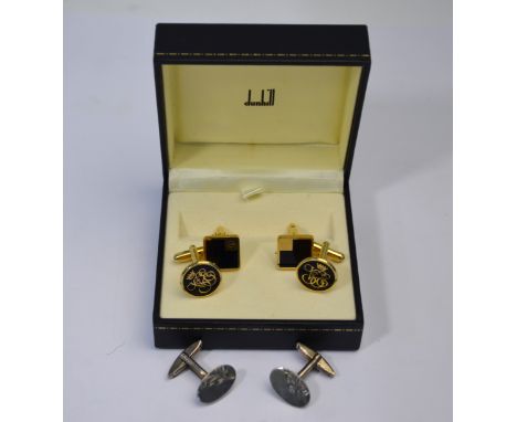 A pair of square gilt metal and black enamel cufflinks by Dunhill, in fitted box to/w a pair of gilt metal and black enamel c