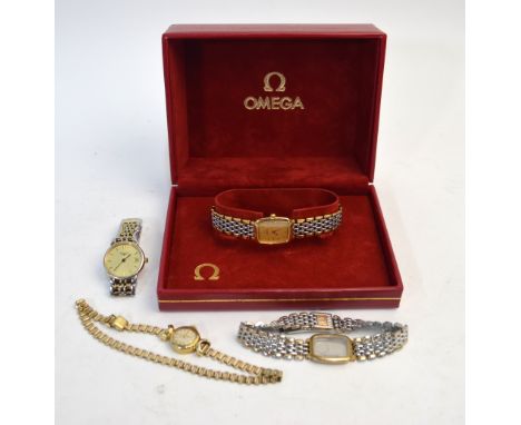 A lady's 14ct Tissot wristwatch on rolled gold bracelet, to/w a boxed Omega DeVille stainless steel and gilt wristwatch, anot