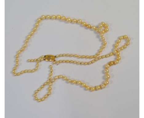 A double row of graduated cultured pearls knotted onto yellow metal snap stamped 9ct and Ciro, in case supplied by Ciro, to/w