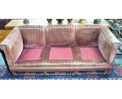 An antique oak barley twist framed pink velveteen upholstered sofa, the worn covers with braided detail, 197 cm long