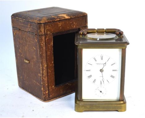 A Camerer Kass &amp; Co London, a 19th century brass cased eight-day two train carriage clock, the white enamelled dial with 