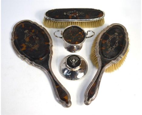 A silver, tortoiseshell and piqué-work three-piece brush and mirror set, London 1919, to/w a similar small capstan inkwell, B