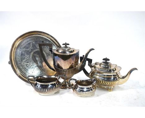 A silver plated four piece tea set of shaped baluster form with fluted decoration comprising hot water, tea pot, sugar basin 