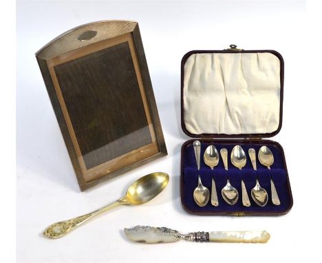 An engine-turned silver photograph frame, Birmingham 1927, to/w a cased set of Hanoverian pattern coffee spoons, Sheffield 19