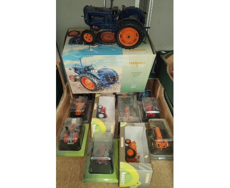 A Universal Hobbies Fordson Major E27N 1:16 scale model with original box, two smaller Universal Hobbies tractors and a selec