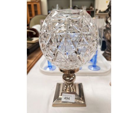 A Waterford crystal cut glass light bowl on a square silver plated candle stick. 