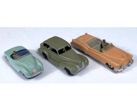 DINKY TOYS: 101 Sunbeam Alpine sports car in blue with dark blue interior and hubcaps, 131 a Cadillac Eldorado pink with grey