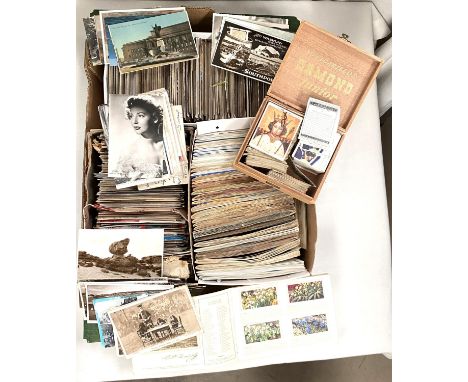 A large selection of Edwardian vintage and later postcards, a selection of cigarette and trade cards 