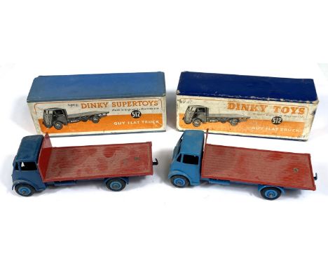 DINKY TOYS: Two 512 one Supertoys Guy Flat Truck, one dark blue with red flat bed one light blue with red flat bed both with 