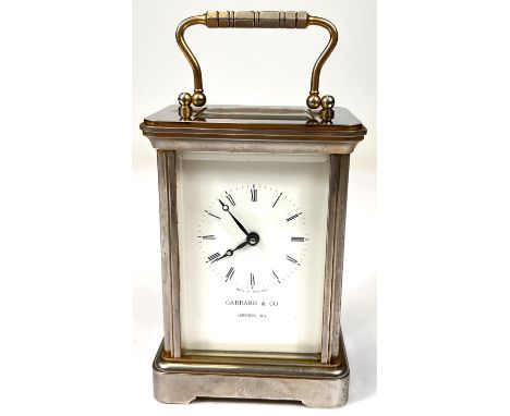 A modern brass carriage clock by Garrard &amp; Co. London. 