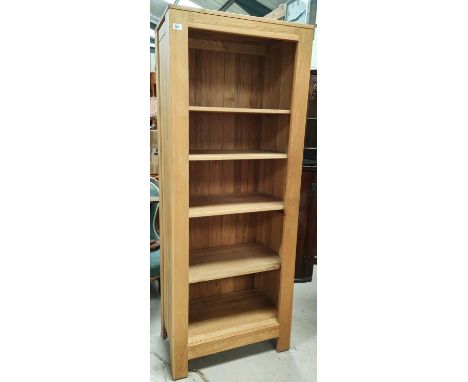 A tall light oak bookcase, five height, 179 x 70 x 40cm 