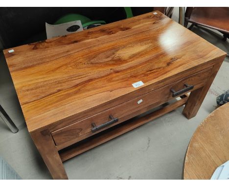 A modern hardwood coffee table with draw beneath and shelf bellow, length 78cm 